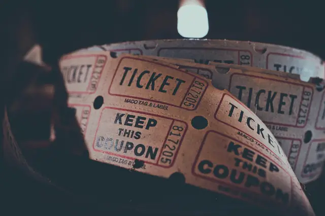 Close-up of a roll of red admission tickets